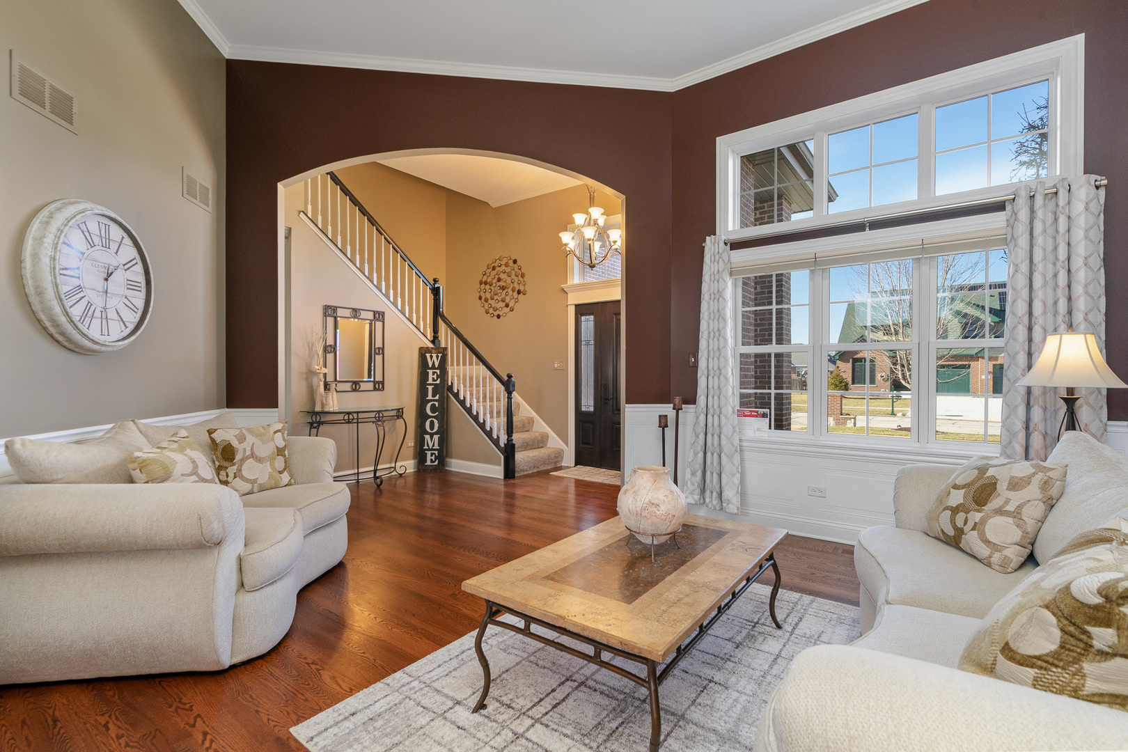 17621 Harper Road Tinley Park, IL 60487 - Photo 5 of 67 a living room with furniture and a large window