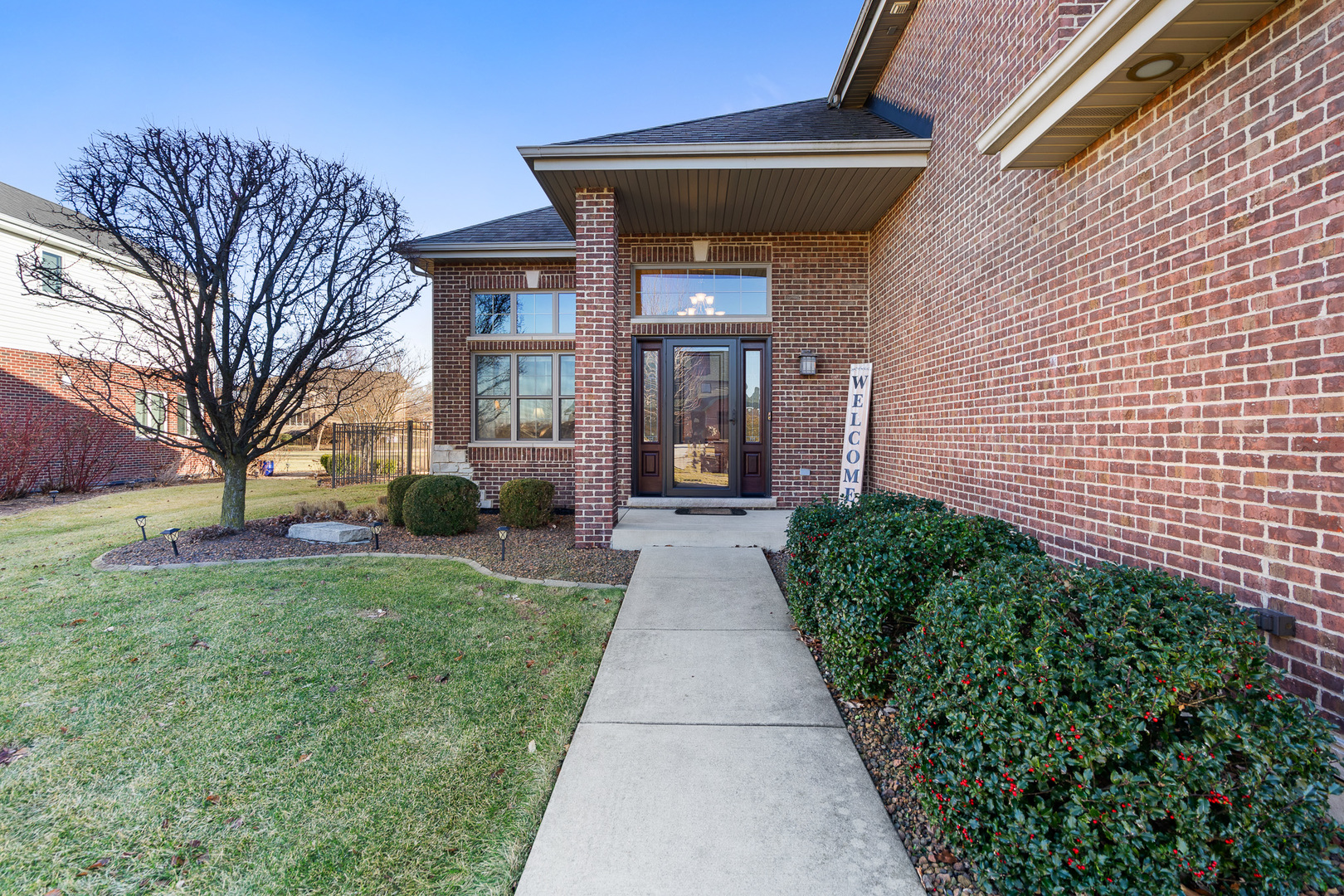 17621 Harper Road Tinley Park, IL 60487 - Photo 65 of 67 a front view of a house with a yard and potted plants