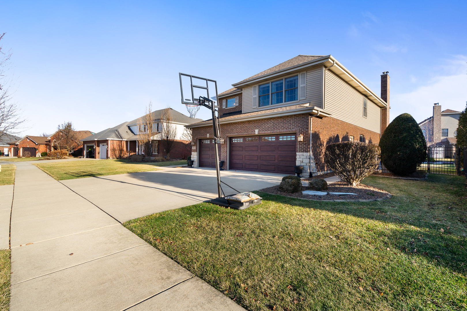 17621 Harper Road Tinley Park, IL 60487 - Photo 66 of 67 a front view of a house with a yard
