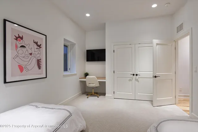 a view of street with parked cars