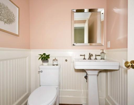 8 Edmonds Road Concord, MA 01742 - Photo 15 of 36 a bathroom with a sink a toilet and shower