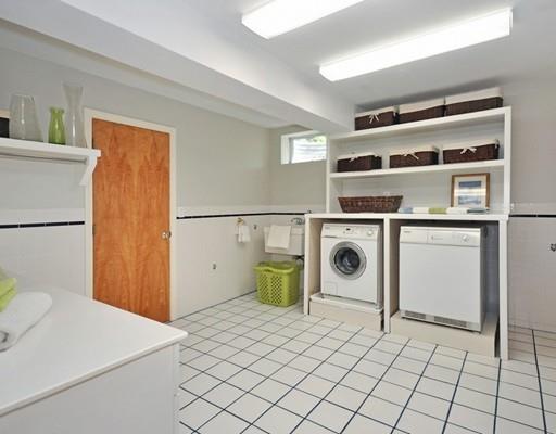 8 Edmonds Road Concord, MA 01742 - Photo 21 of 36 a view of a storage & utility room with a sink