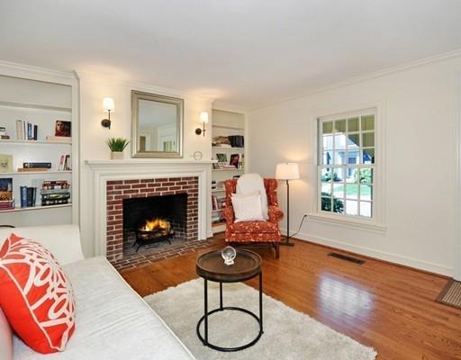 8 Edmonds Road Concord, MA 01742 - Photo 24 of 36 a living room with furniture and a fireplace