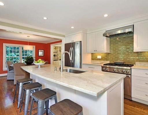 8 Edmonds Road Concord, MA 01742 - Photo 26 of 36 a kitchen with stainless steel appliances granite countertop a sink a stove and a refrigerator