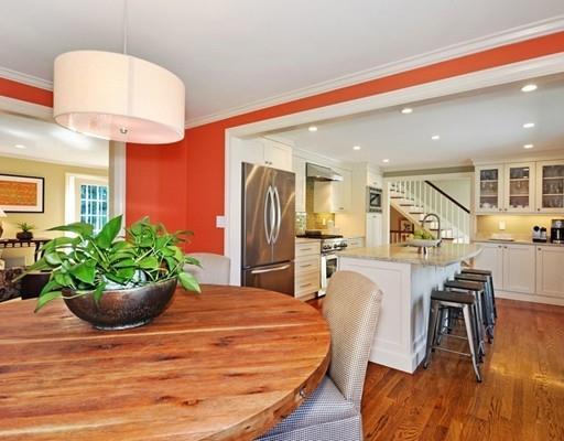 8 Edmonds Road Concord, MA 01742 - Photo 27 of 36 a dining room filled with furniture and a potted plant