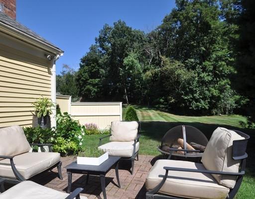 8 Edmonds Road Concord, MA 01742 - Photo 6 of 36 a view of a patio in the backyard