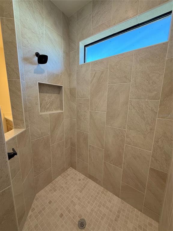 26275 Explorer Road Punta Gorda, FL 33983 - Photo 14 of 22 a bathroom with a shower