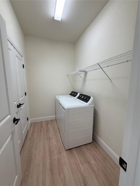 26275 Explorer Road Punta Gorda, FL 33983 - Photo 20 of 22 a utility room with a window dryer and washer