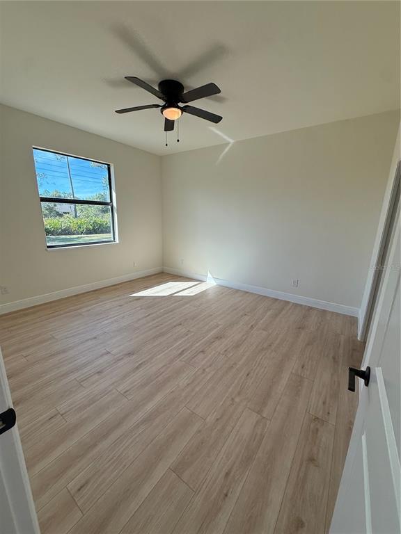 26275 Explorer Road Punta Gorda, FL 33983 - Photo 10 of 22 a view of an empty room with a window