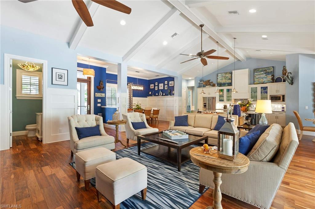 150 Central Avenue Naples, FL 34102 - Photo 4 of 34 a living room with furniture and wooden floor