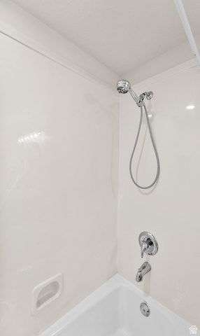 340 Brayden Way Draper, UT 84020 - Photo 43 of 58 White bathtub with integrated shower, chrome-finish fixtures, and a white soap dish
