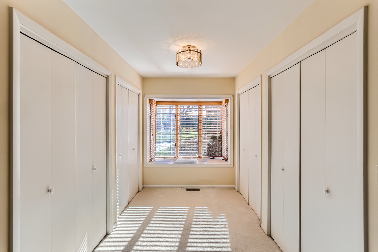 254 Spring Cove Drive Elgin, IL 60123 - Photo 19 of 37 a view of a hallway with windows