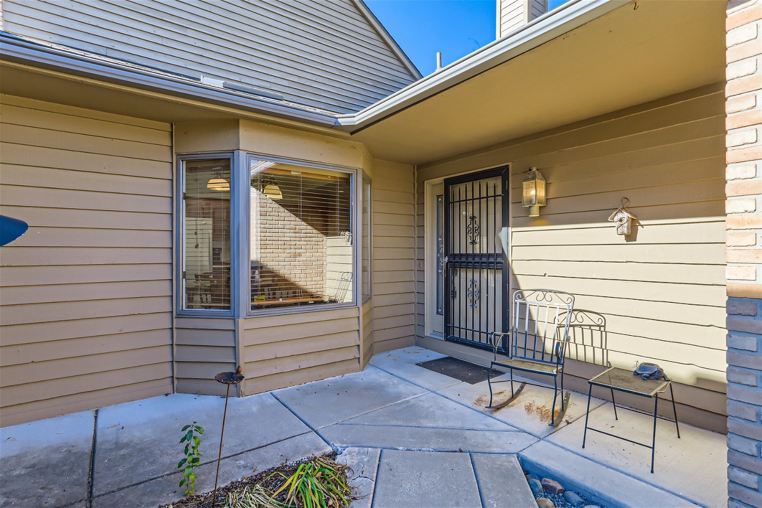 254 Spring Cove Drive Elgin, IL 60123 - Photo 4 of 37 a view of a porch with furniture