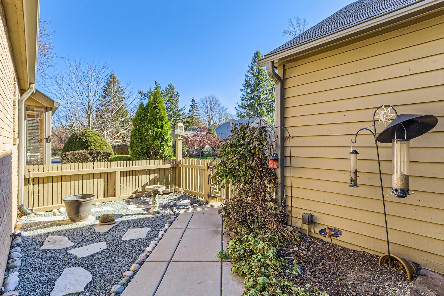 254 Spring Cove Drive Elgin, IL 60123 - Photo 5 of 37 a view of a patio with couches chairs and potted plants