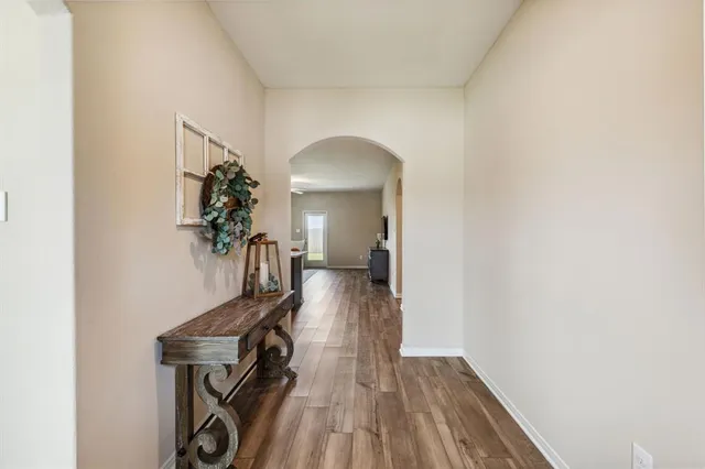 a view of a livingroom with wooden floor