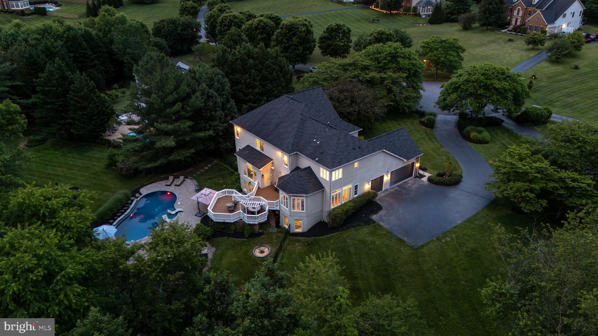 9313 Harrisons Farm Way Laytonsville, MD 20882 - Photo 73 of 77 an aerial view of a house with garden space and street view