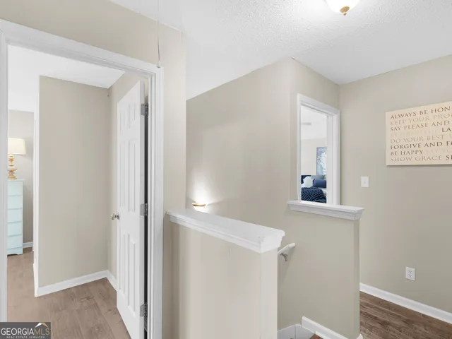 a bathroom with a tub and shower
