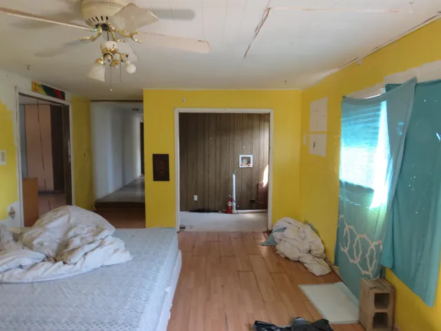 a bathroom with a shower and a toilet