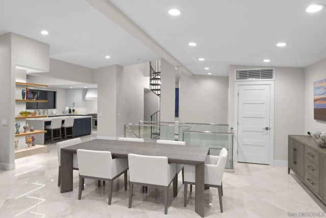 a view of balcony with furniture and city view