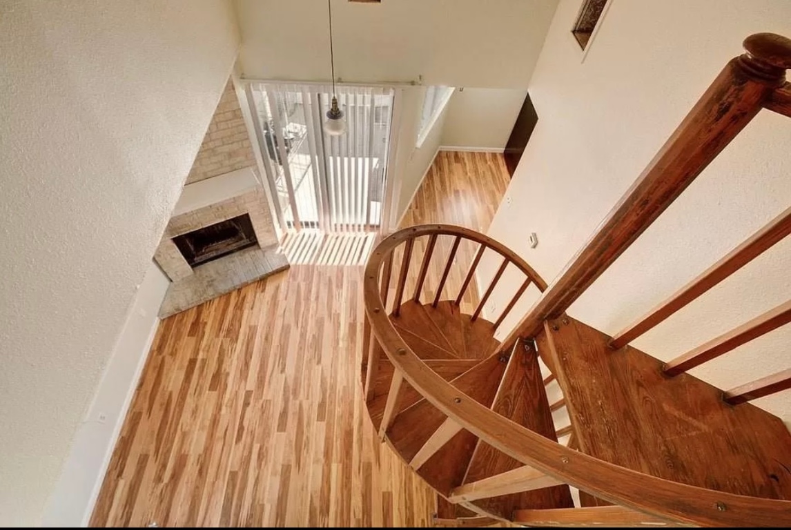 2500 Burleson Road, Unit 317 Austin, TX 78741 - Photo 9 of 12 a view of entryway with wooden floor