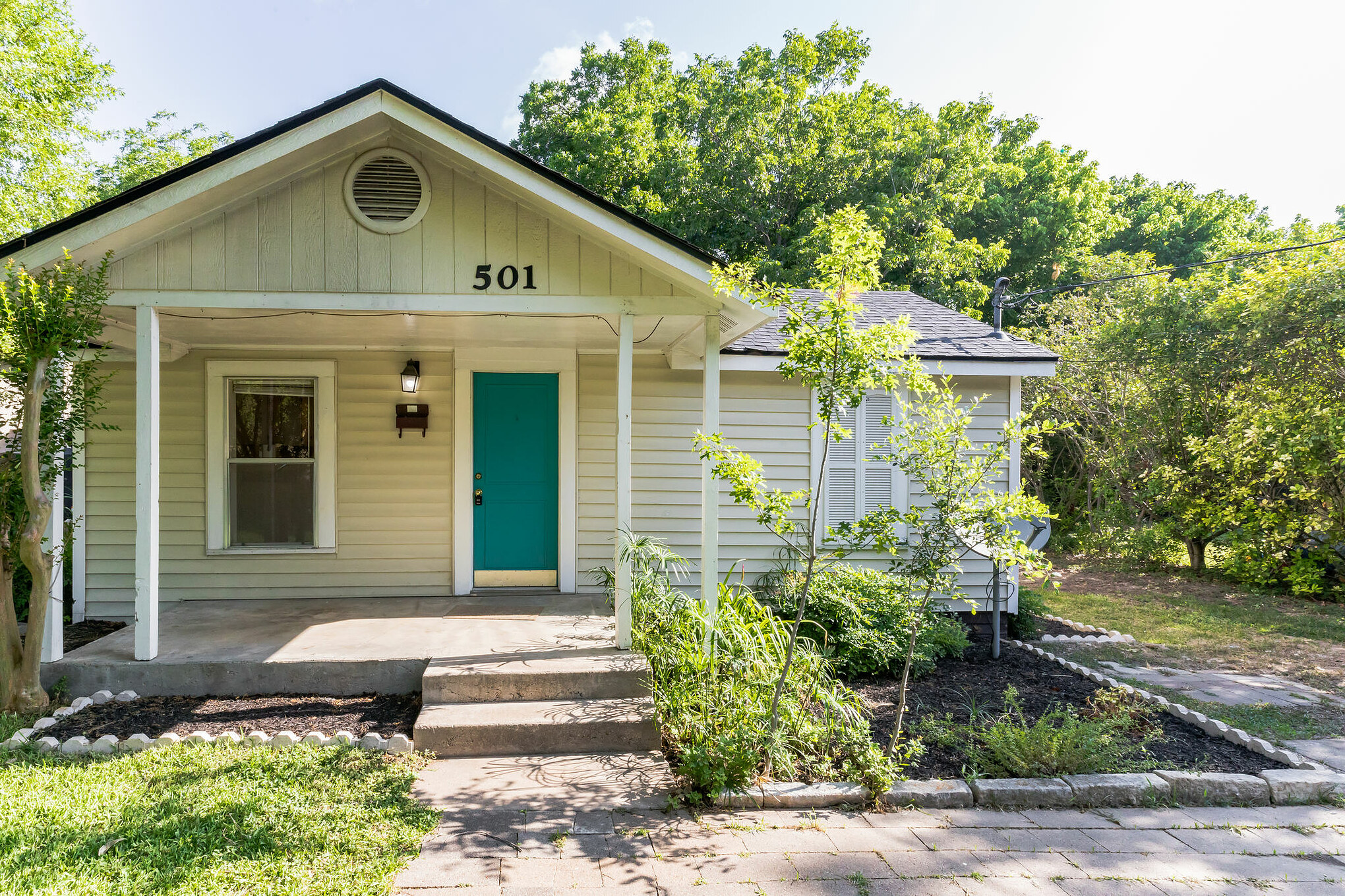 501 East 4th Street Georgetown, TX 78626 - Photo 3 of 25 View of front of property featuring a porch and a shingled roof