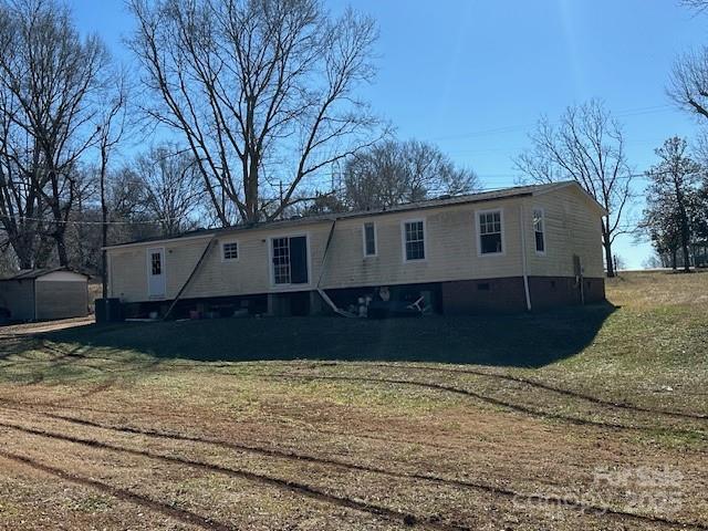 2349 Flint Hill Church Road Shelby, NC 28152 - Photo 4 of 30 a view of a house with a yard