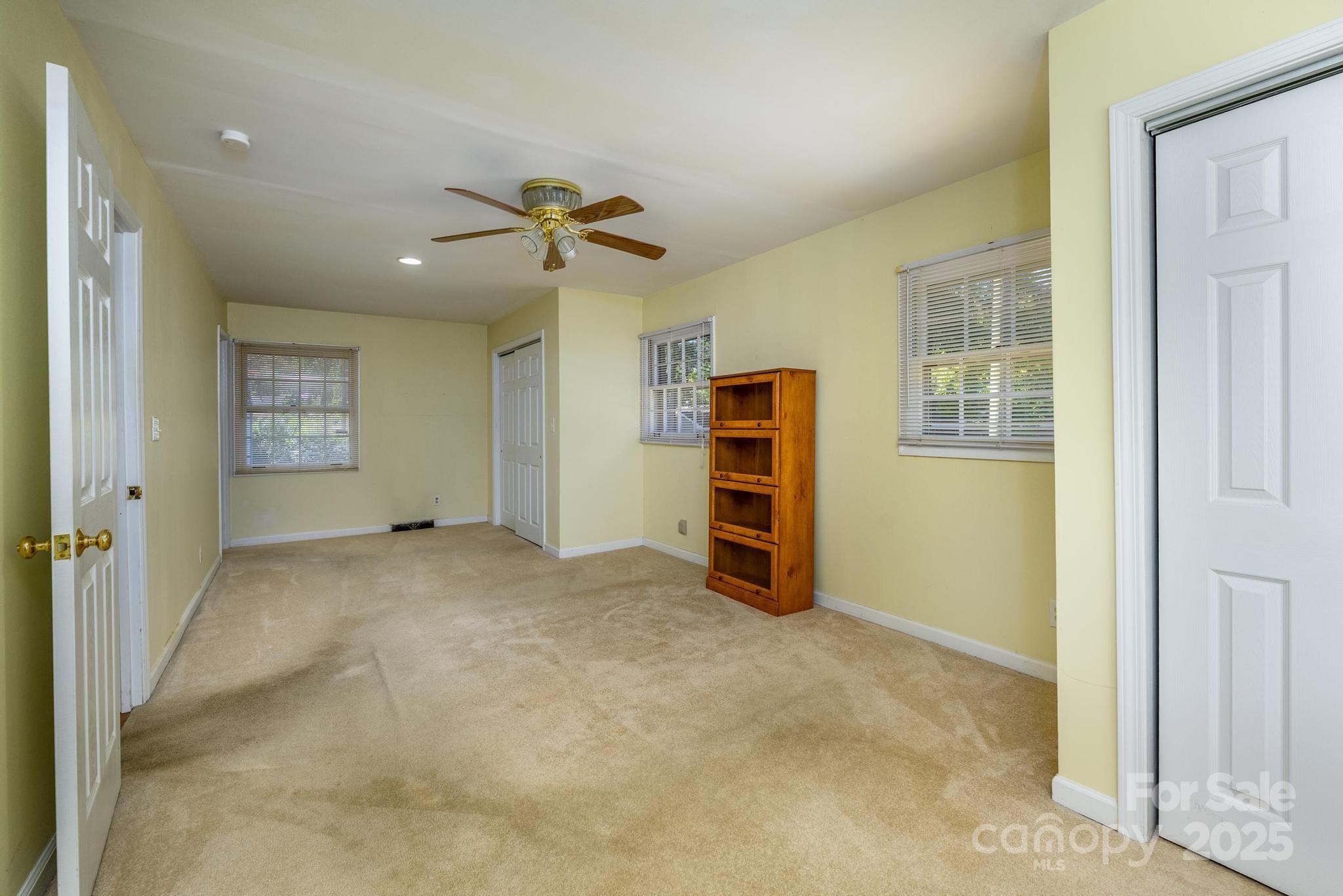 4314 Ivanhoe Place, Unit 26 Charlotte, NC 28205 - Photo 19 of 25 a view of an empty room with a window