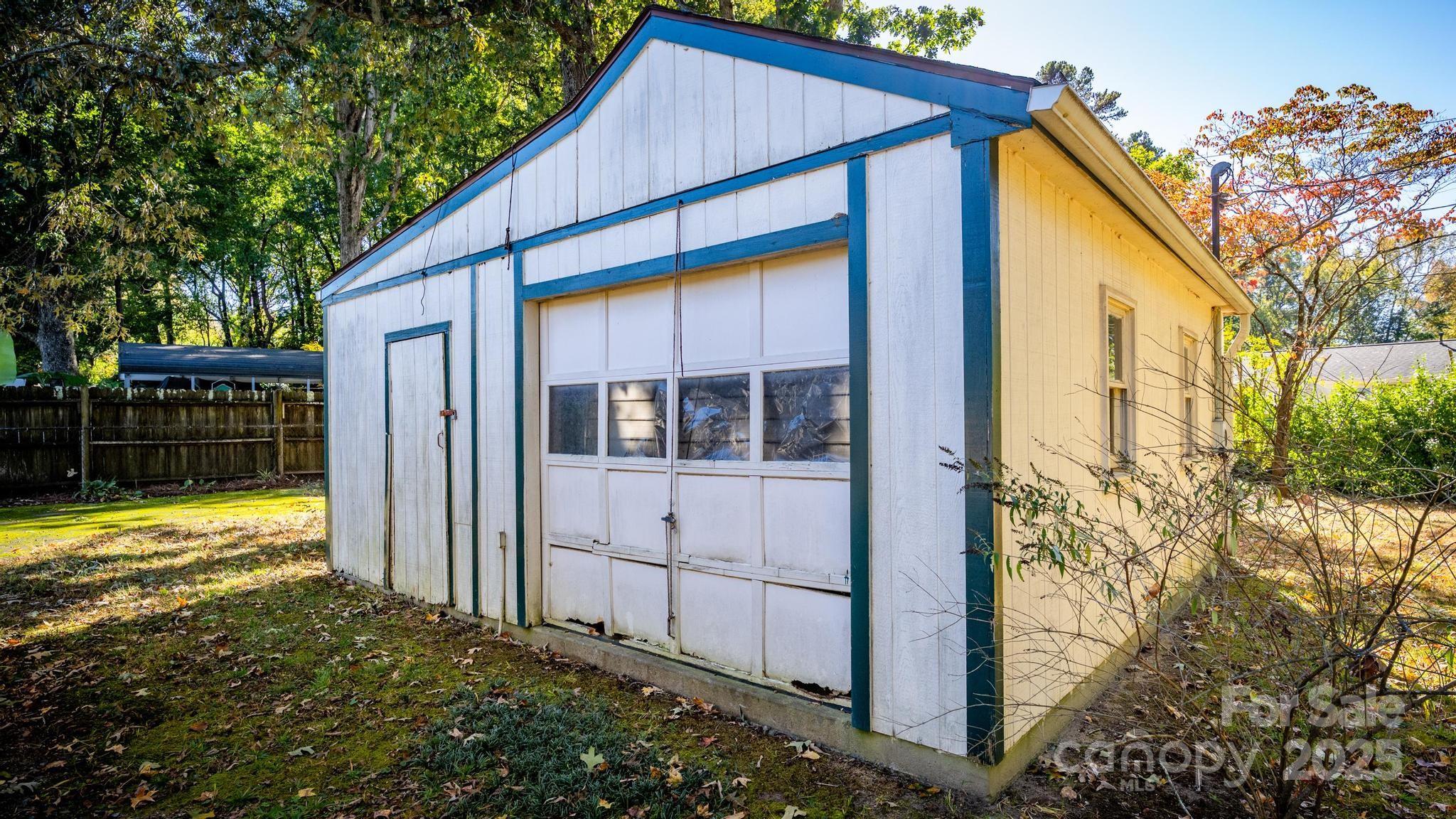 4314 Ivanhoe Place, Unit 26 Charlotte, NC 28205 - Photo 24 of 25 a view of house with backyard