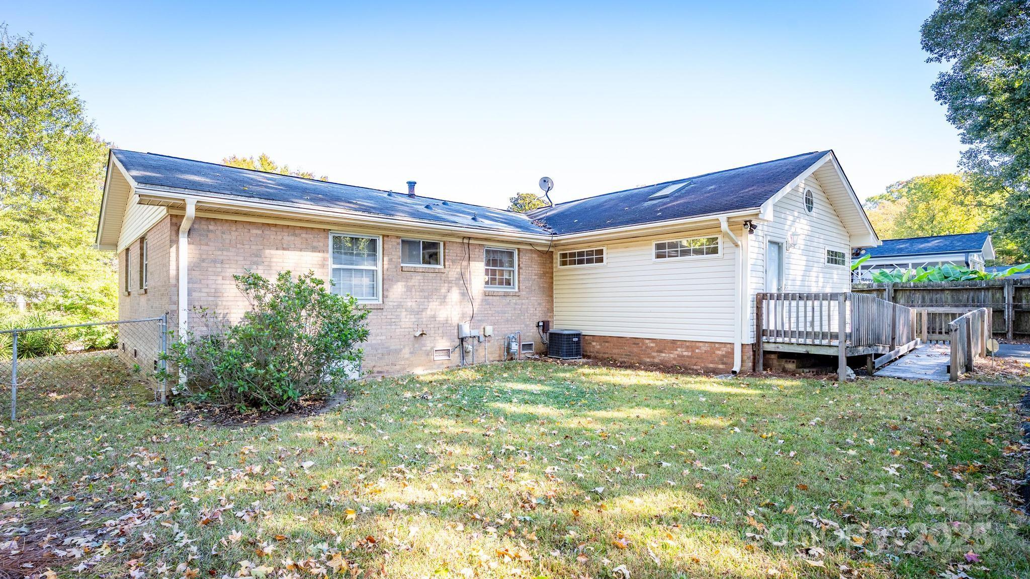 4314 Ivanhoe Place, Unit 26 Charlotte, NC 28205 - Photo 25 of 25 a view of backyard with a garden and plants