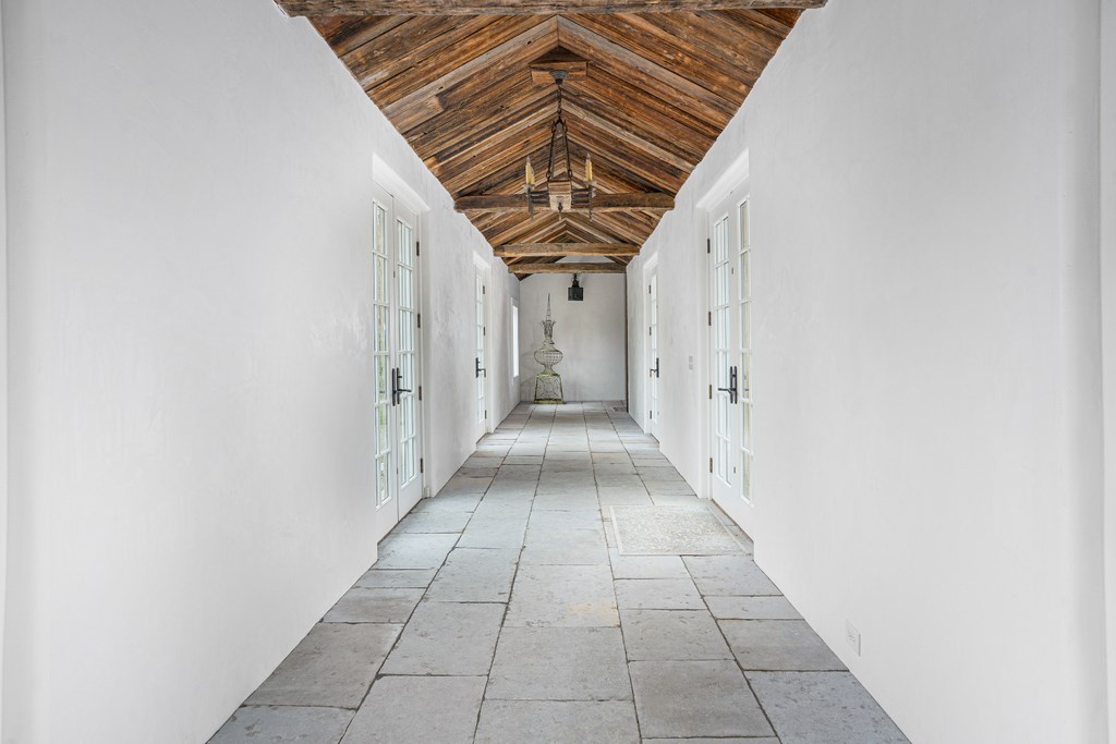 256 East Shore Road Jamestown, RI 02835 - Photo 18 of 40 BREEZEWAY VIEW TO CARRIAGE HOUSE