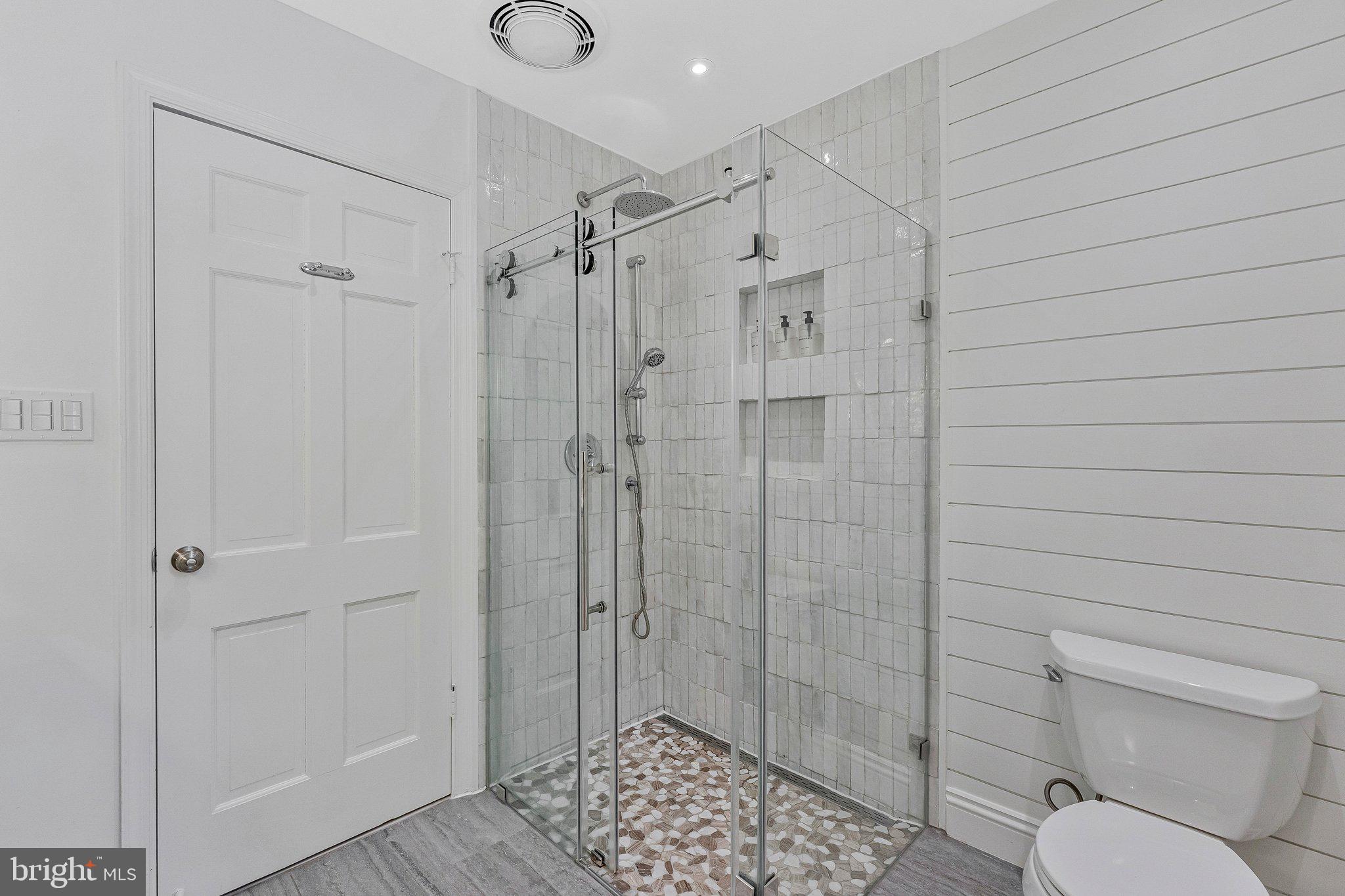 12121 Stirrup Road Reston, VA 20191 - Photo 30 of 67 Master bathroom with hand-made Italian tile