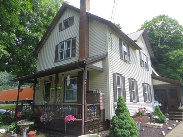258 Main Road Colrain, MA 01340 - Photo 1 of 29 a front view of a house with garden