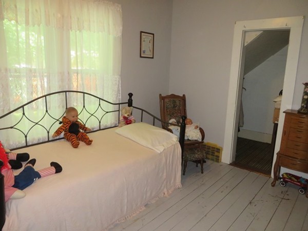 258 Main Road Colrain, MA 01340 - Photo 17 of 29 a bedroom with a bed and wooden floor