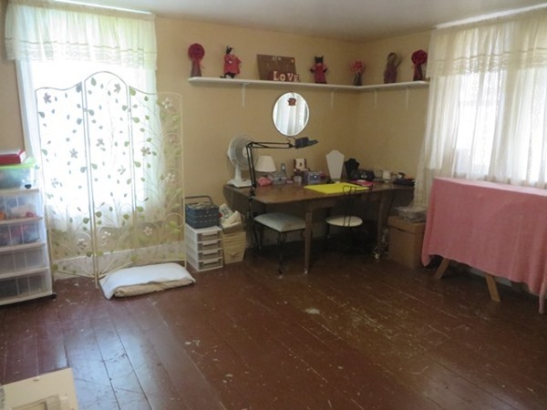 258 Main Road Colrain, MA 01340 - Photo 19 of 29 a living room with furniture and a window