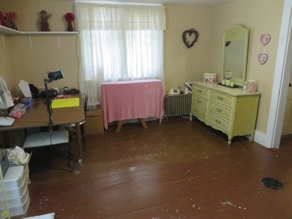 258 Main Road Colrain, MA 01340 - Photo 20 of 29 a room with a bed and a table