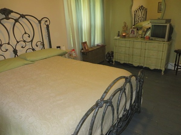 258 Main Road Colrain, MA 01340 - Photo 22 of 29 a bedroom with a bed and a dresser