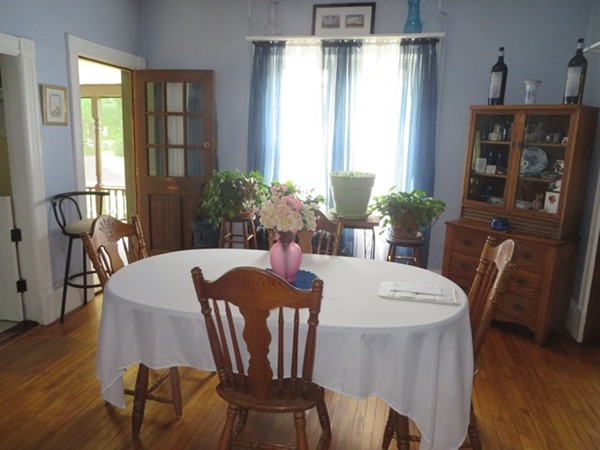 258 Main Road Colrain, MA 01340 - Photo 6 of 29 a view of a dining room with furniture window and wooden floor