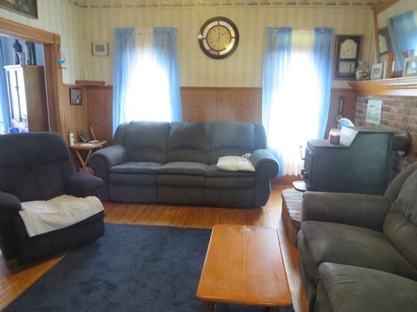 258 Main Road Colrain, MA 01340 - Photo 8 of 29 a living room with furniture and a window