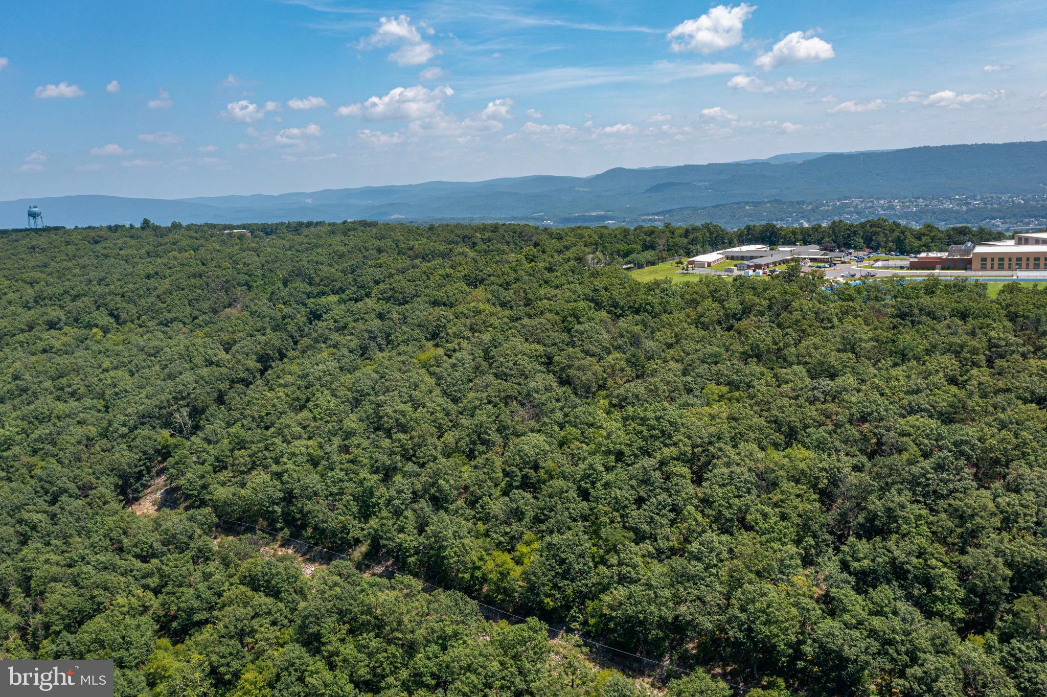 0 Sunset Extended Lavale, MD 21502 - Photo 2 of 3 a view of a big yard with lots of green space and mountain view in back