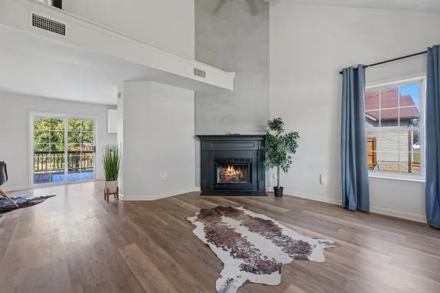 a kitchen with a sink a stove and cabinets