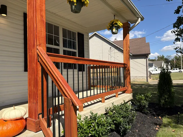 a view of a chairs and tables in the balcony