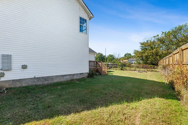 a view of a livingroom with furniture and wooden floor