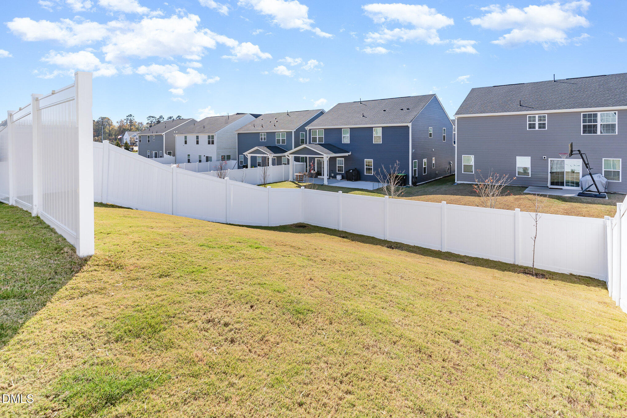 637 Impala Trace Wendell, NC 27591 - Photo 25 of 36 a swimming pool with buildings in the background