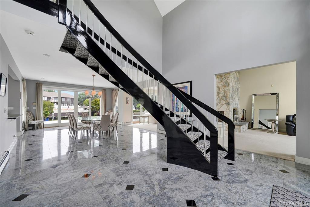 4 Mill Pond Road Hampton Bays, NY 11946 - Photo 8 of 24 a view of entryway and hall