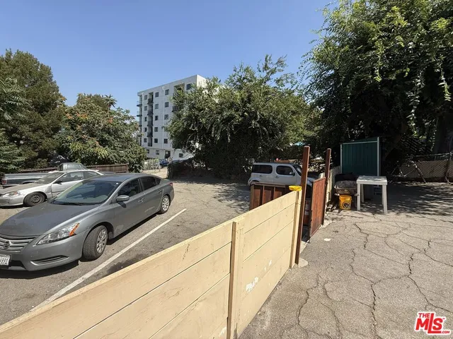 a view of a patio with a sink and chairs