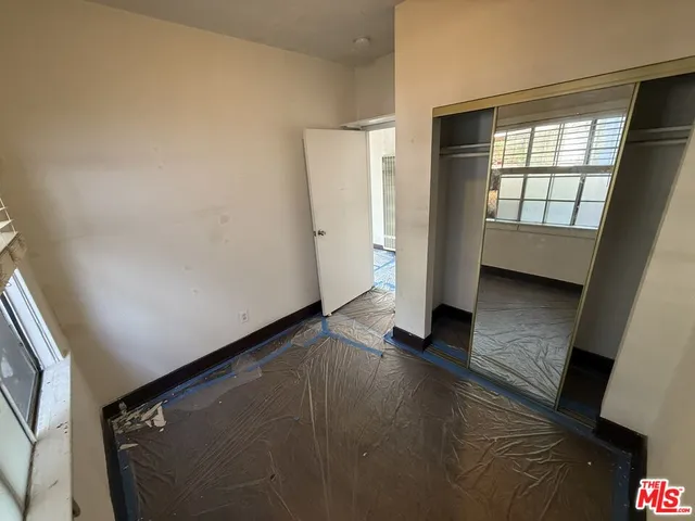 a view of an empty room and window