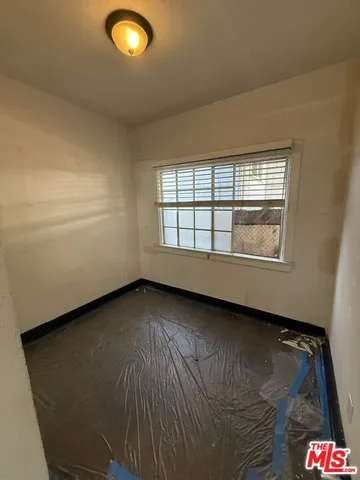 a view of an empty room and window