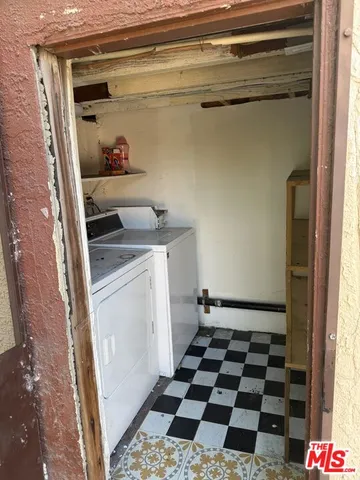 a room with a black white checkered floor