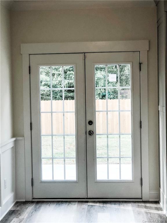 7825 Chestnut Ridge Drive Charlotte, NC 28215 - Photo 28 of 44 a view of an empty room with a window