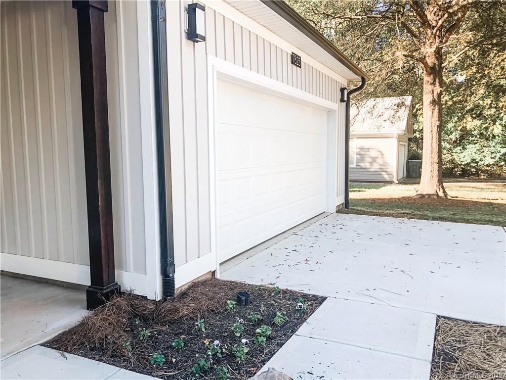 7825 Chestnut Ridge Drive Charlotte, NC 28215 - Photo 4 of 44 a view of a house with a outdoor space